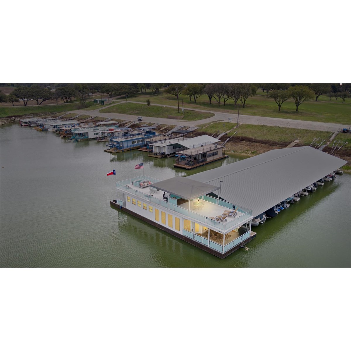 77 ft CustomBuilt Houseboat, located at Ridgewood Country Club marina